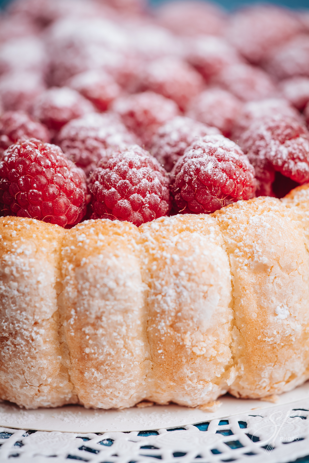 Delicious french Charlotte cake with raspberries