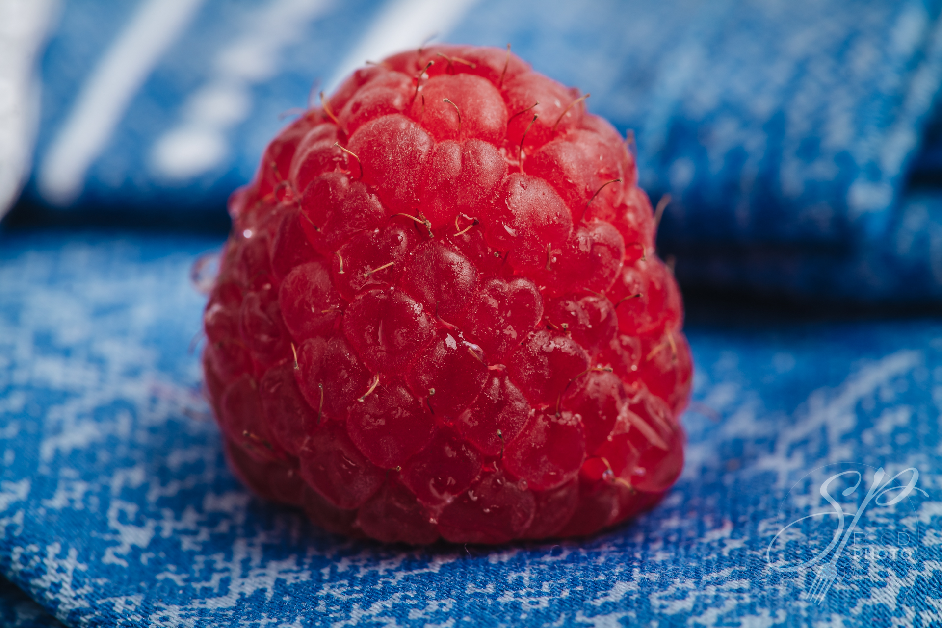 Beautiful macro of a fresh raw raspberry