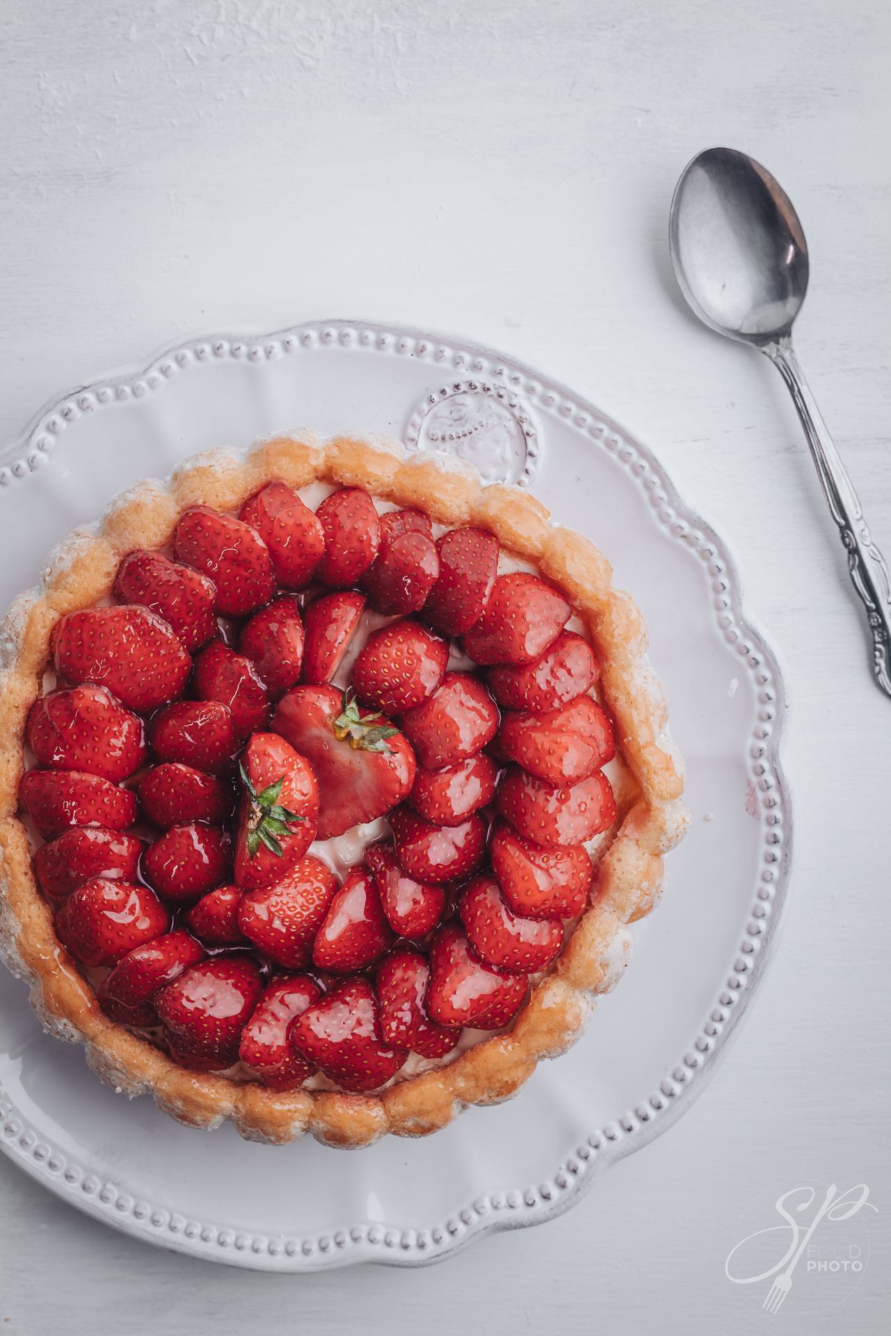 Delicious fresh Charlotte cake with strawberries