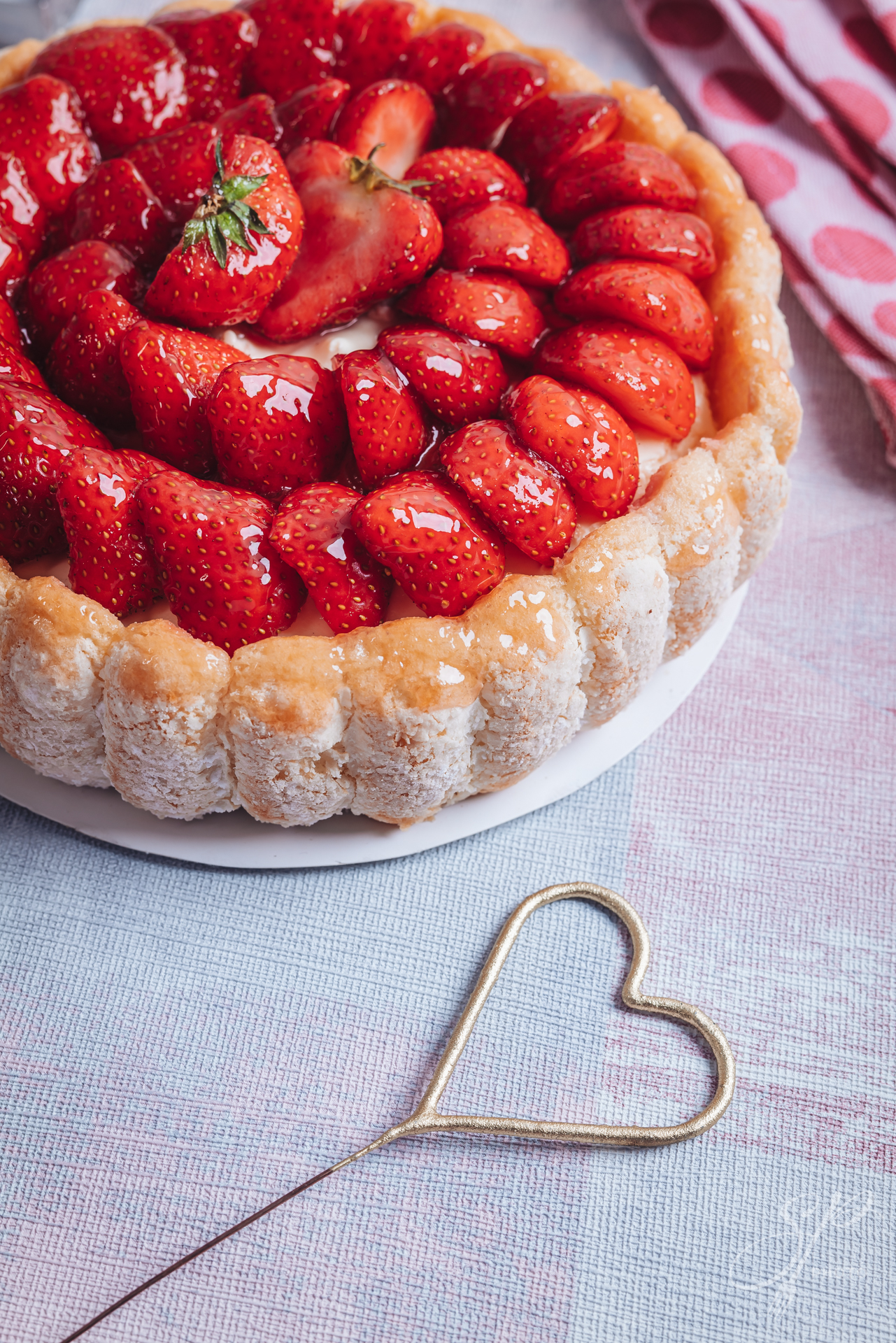 Delicious fresh Charlotte cake with strawberries